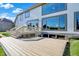 Back of house featuring large windows, walkout basement, and multi-level deck on a sunny day at 5521 Salem N Dr, Carmel, IN 46033