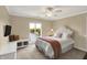 Inviting bedroom showcasing a waterfront view and built-in storage at 5521 Salem N Dr, Carmel, IN 46033