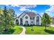 Beautiful two-story home with a well-manicured lawn and mature landscaping at 5521 Salem N Dr, Carmel, IN 46033