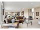 Spacious living room with lake views, open to the kitchen, and filled with natural light at 5521 Salem N Dr, Carmel, IN 46033