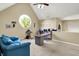 Spacious office with large round window, comfortable seating, and functional workspace at 5521 Salem N Dr, Carmel, IN 46033