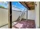 Brick patio with stairs leading to upper level and decorative rock bed at 5521 Salem N Dr, Carmel, IN 46033