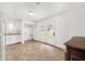 Bright kitchen featuring tiled floors, white cabinets, and a door to the backyard at 605 Memorial Dr, Edinburgh, IN 46124