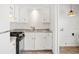 Well-lit kitchen featuring stainless appliances, white cabinets, and modern fixtures at 605 Memorial Dr, Edinburgh, IN 46124