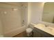 Clean bathroom featuring a shower-tub combo, a modern vanity, and a toilet, ready for customization at 6219 Medina Spirit Dr, Indianapolis, IN 46237