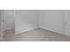 Bedroom closet with neutral carpeting, white walls, and wire shelving at 6219 Medina Spirit Dr, Indianapolis, IN 46237