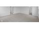 Large neutral bedroom with two doors and wall to wall carpet at 6219 Medina Spirit Dr, Indianapolis, IN 46237