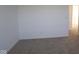Minimalist bedroom featuring plush carpeting, neutral walls, and a bright atmosphere, ready for personalization at 6219 Medina Spirit Dr, Indianapolis, IN 46237