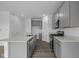 Modern kitchen with stainless steel appliances, granite counters, island, and an open floorplan at 6219 Medina Spirit Dr, Indianapolis, IN 46237