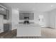 Modern kitchen with stainless steel appliances, granite counters, island, and an open floorplan at 6219 Medina Spirit Dr, Indianapolis, IN 46237