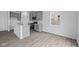 Modern kitchen with stainless steel appliances, granite counters, island, and an open floorplan at 6219 Medina Spirit Dr, Indianapolis, IN 46237