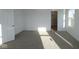 Comfortable main bedroom featuring soft carpeting, an ensuite bathroom, and a window for natural light, ready for customization at 6219 Medina Spirit Dr, Indianapolis, IN 46237