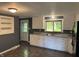 Kitchen with backyard access and tile floors at 7897 Moore Rd, Indianapolis, IN 46278