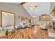 Inviting living room featuring hardwood floors, vaulted ceilings, and cozy furniture at 802 Echo Trl, Martinsville, IN 46151