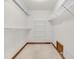 Walk-in closet with carpet flooring, white wire shelving, and wood trim at 802 Echo Trl, Martinsville, IN 46151