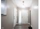View of entryway with coat rack and light fixture at 8066 Cardinal Cove E Dr, Indianapolis, IN 46256