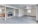 Basement features a decorative stone fireplace and ample open space at 8903 Maple Hill Dr, Indianapolis, IN 46239