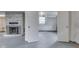 Basement features a decorative stone fireplace with multiple rooms at 8903 Maple Hill Dr, Indianapolis, IN 46239