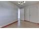 Bedroom with hardwood floors, light fixture and closet space at 8903 Maple Hill Dr, Indianapolis, IN 46239