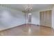 Bedroom with hardwood floors, light fixture and closet space at 8903 Maple Hill Dr, Indianapolis, IN 46239