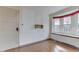 Bedroom featuring hardwood floors, a bay window and closet at 8903 Maple Hill Dr, Indianapolis, IN 46239