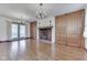 Bright living room with hardwood floors, fireplace and french doors at 8903 Maple Hill Dr, Indianapolis, IN 46239