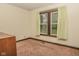 Bedroom boasting hardwood window trim, carpeting, and neutral walls at 8944 W 21St St, Indianapolis, IN 46234