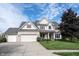 Beautiful two-story home with attached garage, landscaped yard, and inviting curb appeal in a Gathering-friendly neighborhood at 8970 Buttercup Ct, Noblesville, IN 46060