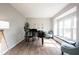 Cozy living room with a piano, window seat, and ample natural light at 8970 Buttercup Ct, Noblesville, IN 46060