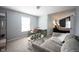 Open living room featuring a view to the office area and primary bedroom with ensuite bath at 8970 Buttercup Ct, Noblesville, IN 46060