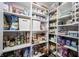 Walk-in pantry with ample shelving for storage of food and household items at 8970 Buttercup Ct, Noblesville, IN 46060