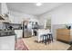 Functional kitchen with white cabinets, stainless steel appliances, and a center island at 925 S State Ave, Indianapolis, IN 46203