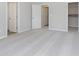 Spacious bedroom with plush carpet, featuring a walk-in closet and ensuite bathroom at 9767 Behner Dr, Fishers, IN 46250