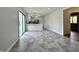 Bright eat-in kitchen with stainless steel appliances, white cabinets, and sliding doors to the outdoors at 100 Lincoln St, Plainfield, IN 46168