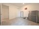 Cozy bedroom with neutral walls, carpet floors, and a folding cot at 10107 Camp Creek Way, Indianapolis, IN 46229