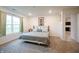 Comfortable bedroom featuring a wrought iron bed frame, soft colors, and natural light at 10107 Camp Creek Way, Indianapolis, IN 46229