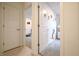 Hallway showing doorway views into a room with decor, and another room beyond at 10107 Camp Creek Way, Indianapolis, IN 46229