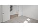 Cozy bedroom with neutral carpet, showcasing a hallway with stairs at 10126 Redwood Peak Ln, Indianapolis, IN 46259