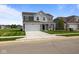 Charming two-story home with attached two car garage and well-manicured lawn at 10126 Redwood Peak Ln, Indianapolis, IN 46259