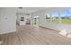 Open-concept living space with abundant light and seamlessly flowing to kitchen area at 10126 Redwood Peak Ln, Indianapolis, IN 46259