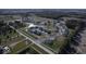 Stunning aerial view of a new home community featuring ponds, green spaces, and well-designed homes at 10544 Maidenhair Dr, Indianapolis, IN 46239