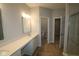 Bathroom featuring double sink vanity with ample counter space and walk-in shower at 10544 Maidenhair Dr, Indianapolis, IN 46239