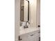 Modern bathroom with sleek fixtures, black faucet, and white marble countertop vanity at 1147 Kelsneland Dr, Avon, IN 46123