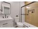 Modern bathroom with a glass shower, vanity, and stylish mirror at 1147 Kelsneland Dr, Avon, IN 46123