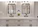 Elegant bathroom with dual vanities, modern mirrors, and stylish black hardware at 1147 Kelsneland Dr, Avon, IN 46123