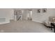 Spacious upper level featuring neutral carpet and walls, complete with comfortable seating and an upper level hallway at 1147 Kelsneland Dr, Avon, IN 46123