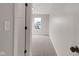 Neutral bedroom featuring gray carpet, white trim, and a bright window at 1147 Kelsneland Dr, Avon, IN 46123