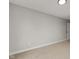Spacious room featuring neutral carpet and gray walls; minimalist design at 1147 Kelsneland Dr, Avon, IN 46123