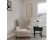 Cozy bedroom corner featuring chair, a modern side table and an inviting window, complete with stylish decor at 1147 Kelsneland Dr, Avon, IN 46123