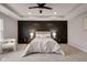 Spacious main bedroom featuring coffered ceilings, and an accent wall behind the bed at 1147 Kelsneland Dr, Avon, IN 46123